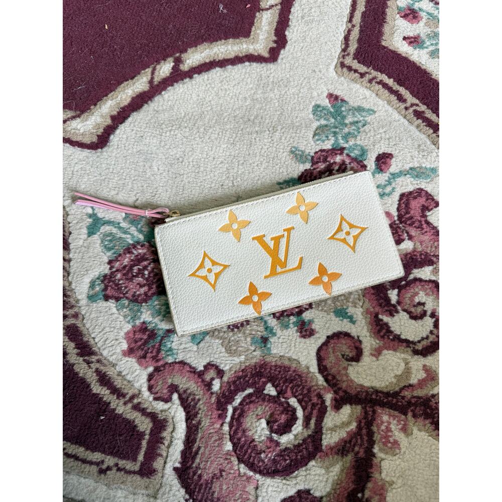 Louis Vuitton Neverfull Empreinte MM Pochette